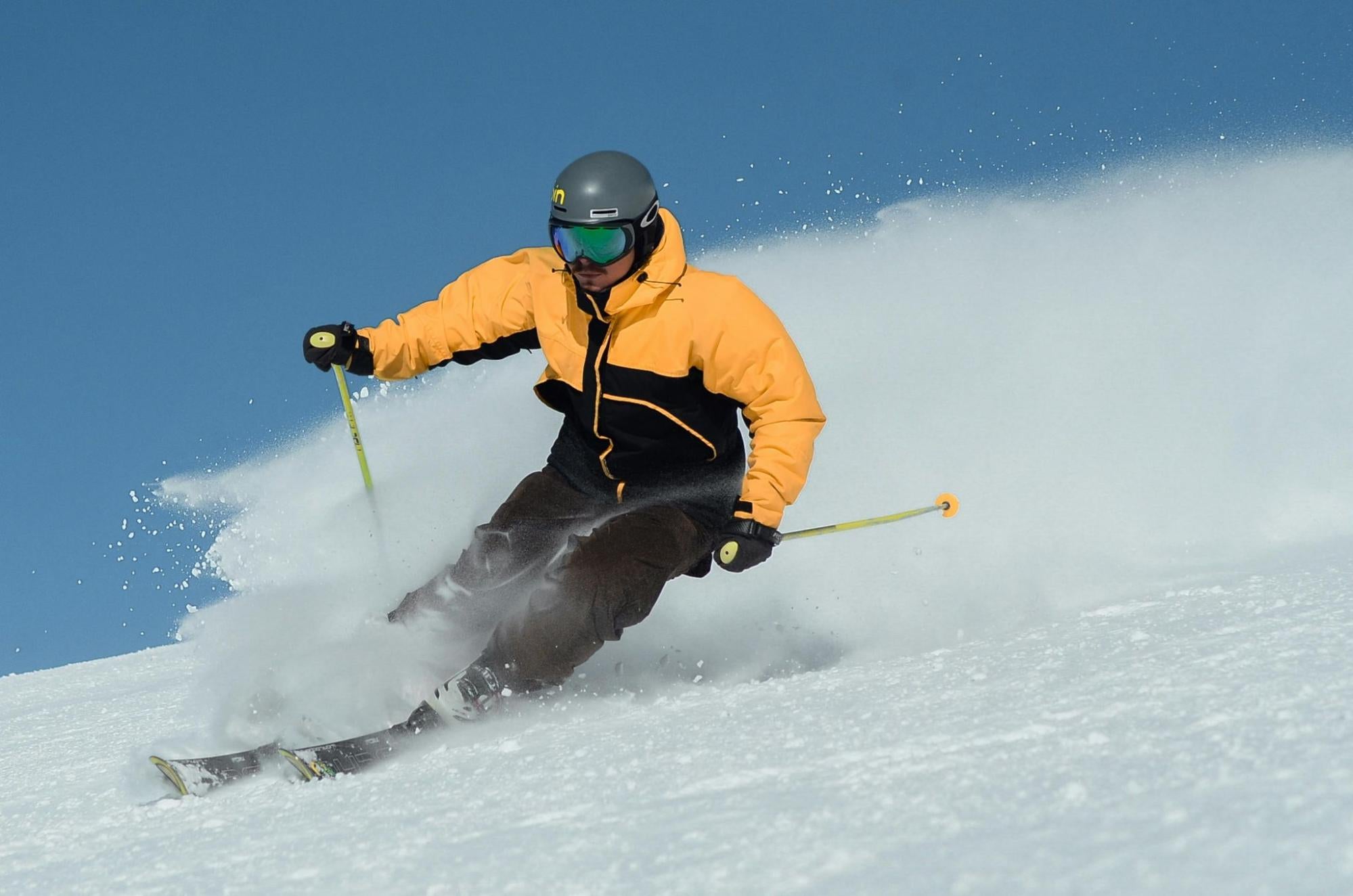 A man skiing down a slope.