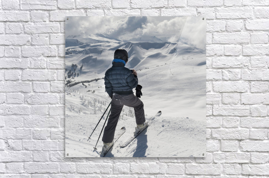 A Skier Pauses On The Trail To Look Out Over The Mountains; Whistler, British Columbia, Canada - Powderaddicts