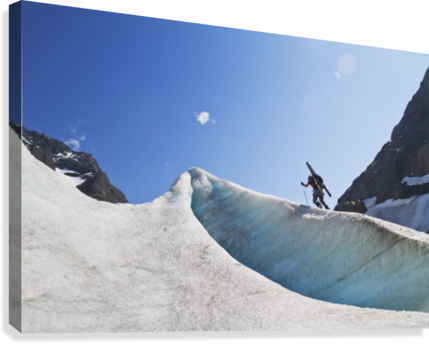 Backcountry skier above the Eklutna Glacier, Western Chugach Mountains, Southcentral Alaska, Winter - Powderaddicts