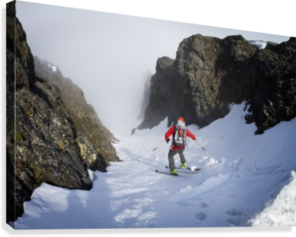 Backcountry skier on West Twin Peak near Eklutna, Western Chugach Mountains, Southcentral Alaska, Winter - Powderaddicts