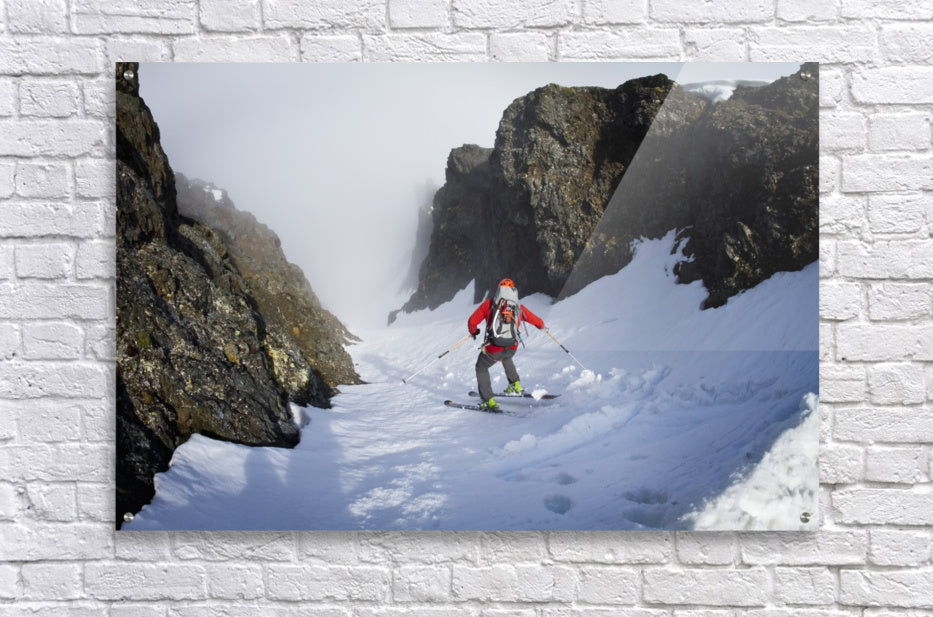 Backcountry skier on West Twin Peak near Eklutna, Western Chugach Mountains, Southcentral Alaska, Winter - Powderaddicts