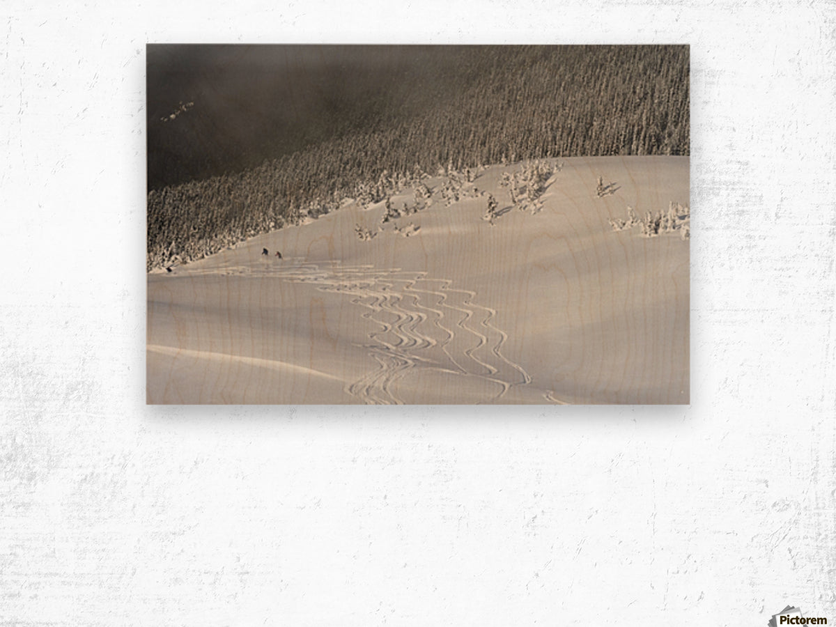 Skiers At The Base Of A Mountain; Whistler - Powderaddicts