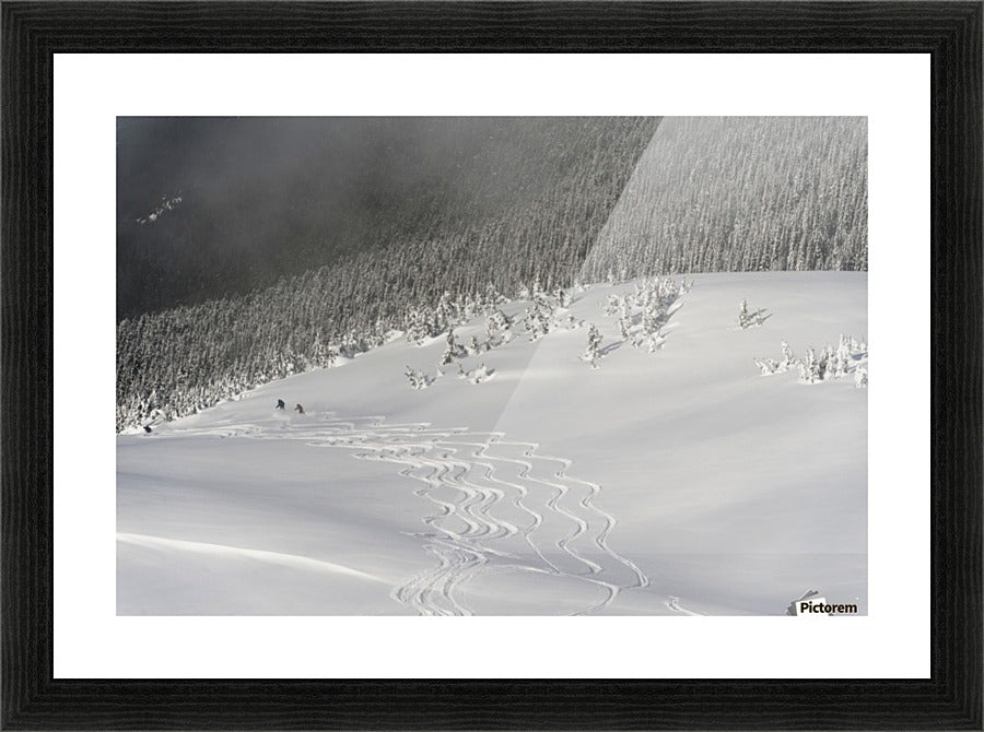 Skiers At The Base Of A Mountain; Whistler - Powderaddicts